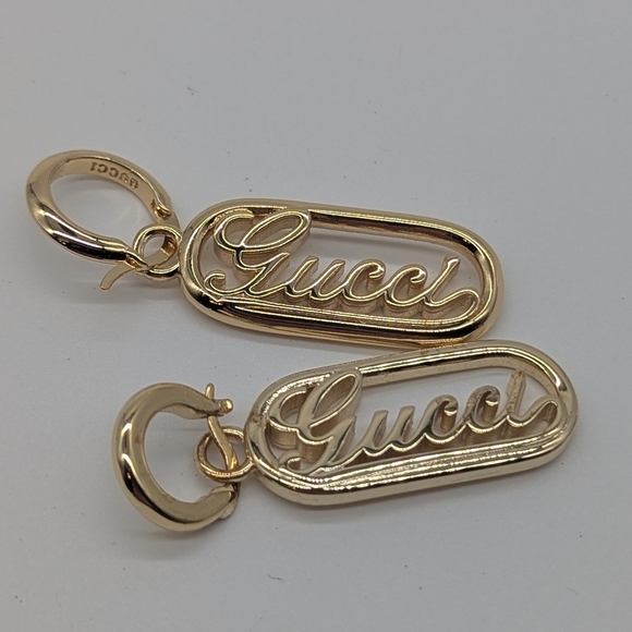 Gucci Gold-Tone Script Logo Drop Earrings - Picture 1 of 5